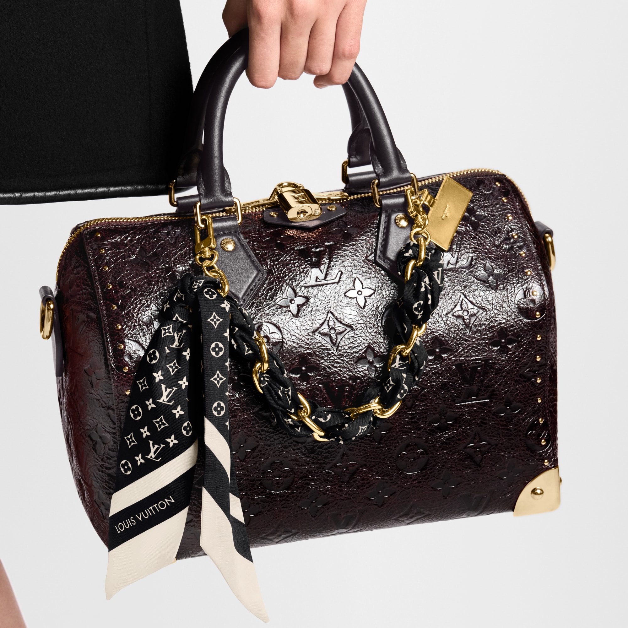 Alça de Smartphone e Charm de Bolsa Monogram Silhouette S00